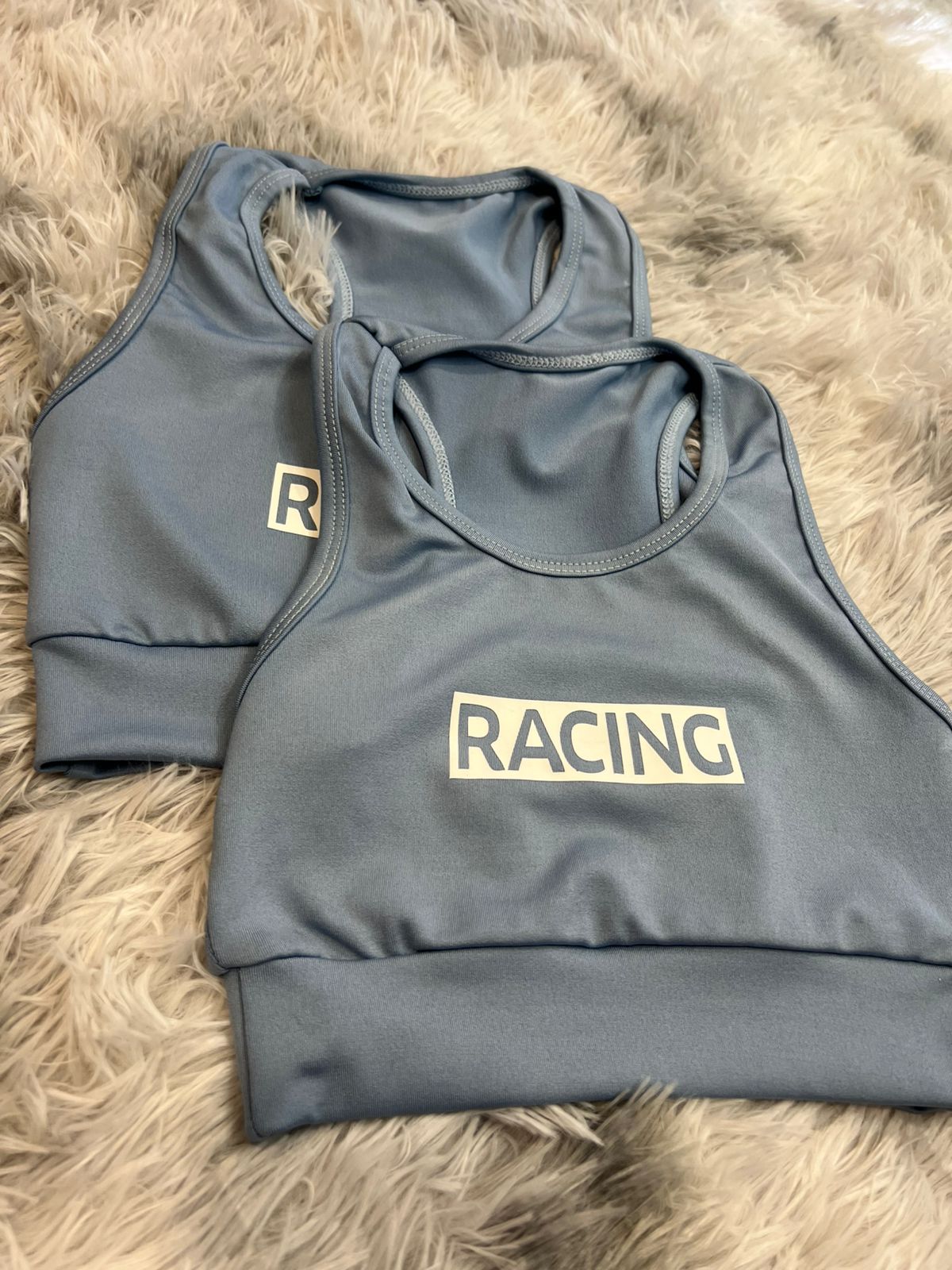 NTDC-0024 Top Niña RACING celeste - Imagen 1